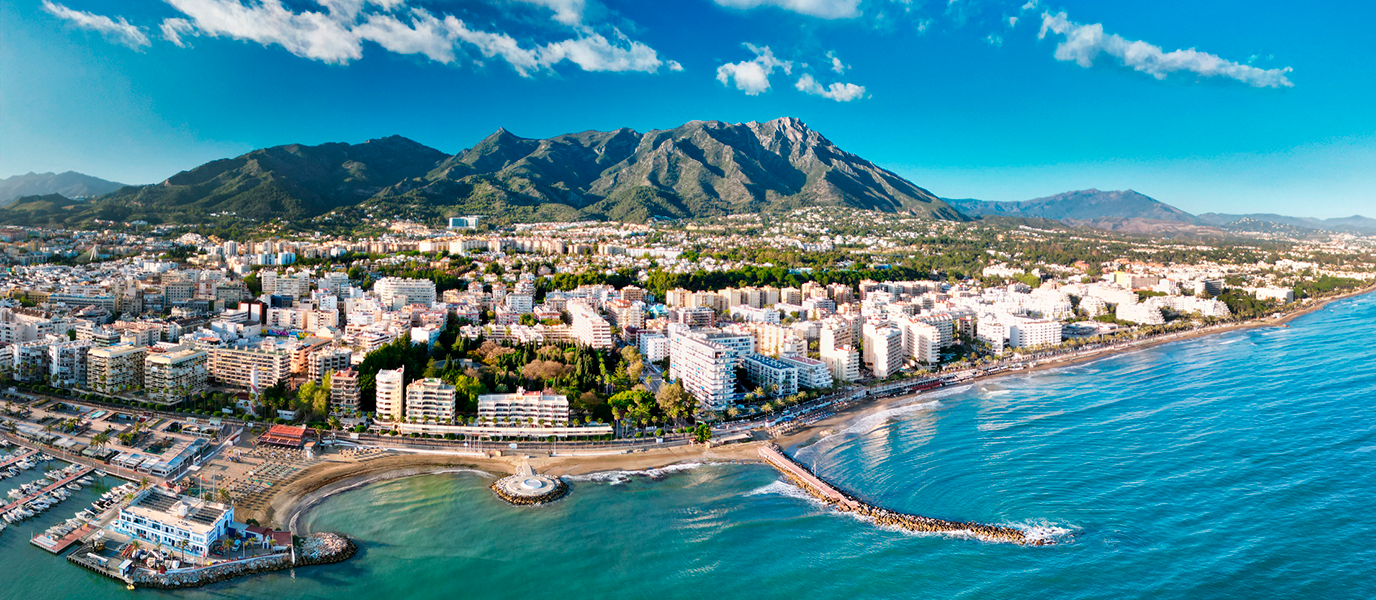 Aerial view of Marbella coastline, marina, Mediterranean Sea and La Concha mountain